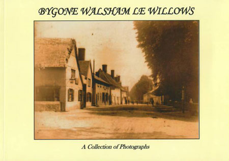 cover image c1900 looking down the street (dirt road) from the crossroads with the six bells public house on the left