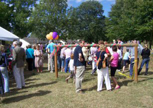 Parents and Children enjoying the inaugural party for the opening of Walsham Play Park
