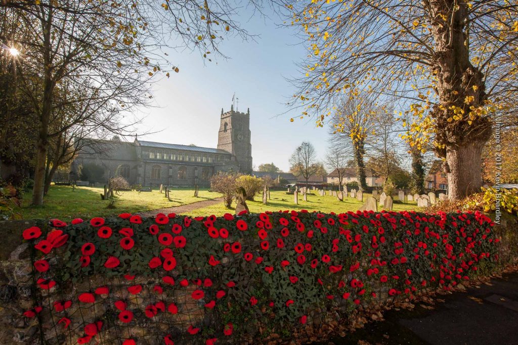 St Mary's Walsham le Willows, church wall adorned with poppies for Armistace Day